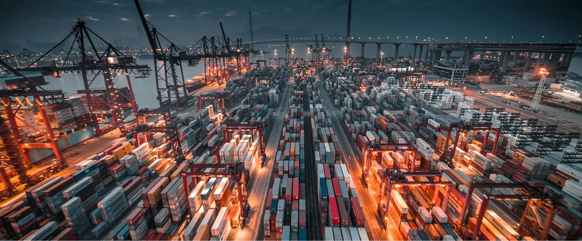 Container port lit up at dusk